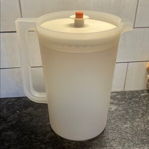 Vintage Tupperware One Gallon Translucent White Pitcher with Orange Lid.